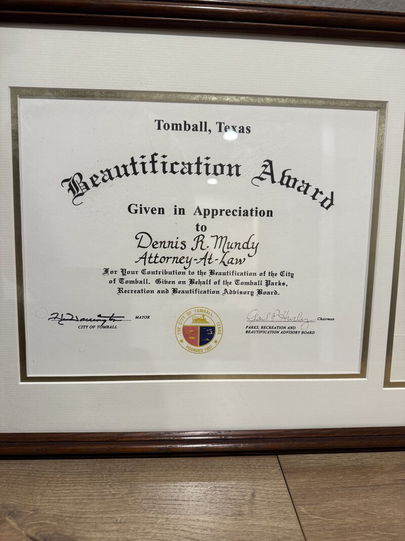 City of Tomball Beautification Award certificate presented to Dennis R. Mundy, Attorney-At-Law, signed by Mayor H.G. Harrington and Chairman Gail B. Hurley of the Parks, Recreation and Beautification Advisory Board